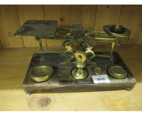 A VICTORIAN BRASS LETTER SCALES with various brass weights