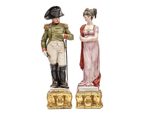 2 painted porcelain figures, Napoleon and Josephine,  he in full dress uniform with bicorne hat, sword and telescope, she in 