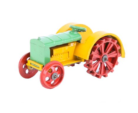 A scarce Meccano Dinky Toys Farm Tractor 22e. An example in green, yellow and red, with hook. VGC for age, very minor chips P