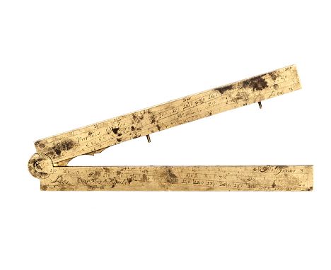 A late 18th century French gunner’s folding brass rule, 13¾” open, engraved with maker’s name “Langlois, Paris”, and with var
