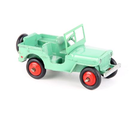 A rare Dinky Toys Jeep 25J 1947-1948. In another shade of light green with red wheels and black tyres, with screen, open stee