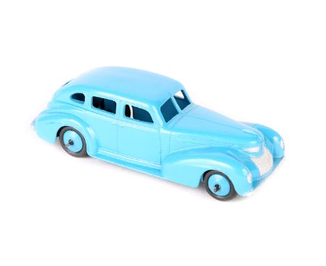 A rare Dinky Toys Chrysler Royal Sedan 39e. An example in light blue with ridged light blue wheels and black tyres, mottled b