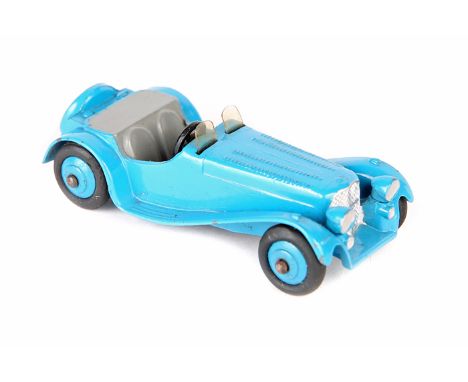 Dinky Toys Jaguar SS100 38f. In light blue with light grey seats and tonneau, screens, open steering wheel, mid blue ridged w