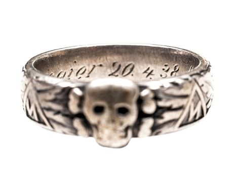 A Third Reich SS officer’s “Totenkopf” presentation ring, silver coloured, the inside engraved “S.lb. Kiermaier 20.4;38” and 