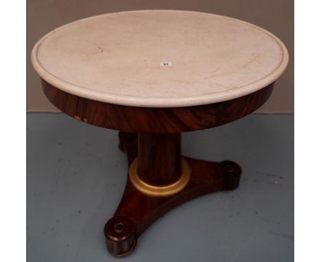 A FRENCH 19TH CENTURY MARBLE TOPPED MAHOGANY CENTRE TABLE, the circular cream top over a plain pedestal with gilt engine turn