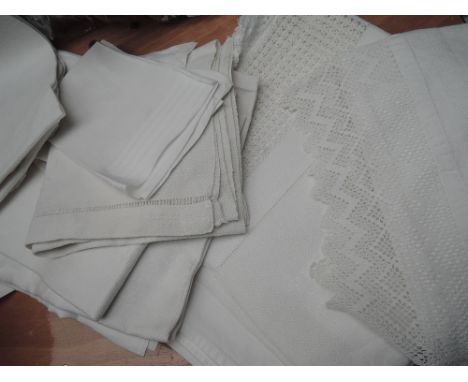 A selection of antique huckaback towels, cotton lace edged shelf linings,tray cloths and similar.