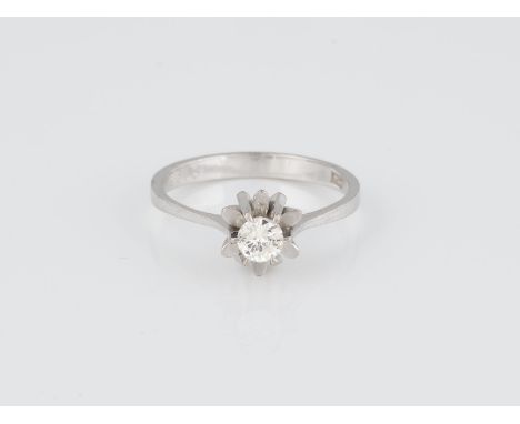 RING Weißgold. Ringmaß ca. 54, Ges.-Gew. ca. 3 g. Gest. 585. Ein Brillant, ca. 0,20 ct. Part. besch.