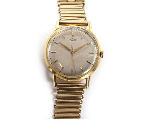 An 18ct gold JW Benson watch on a later 9ct gold bracelet, with a circular 32mm diameter case, a silvered dial, applied gilt 