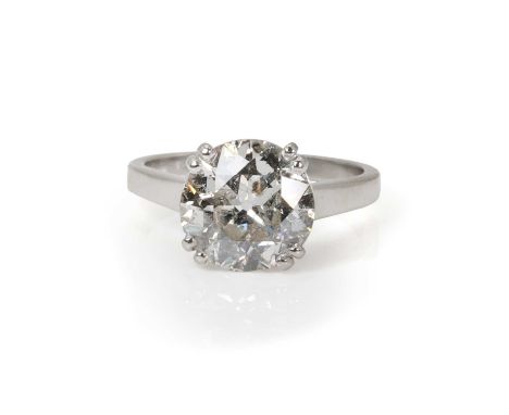 A single stone diamond ring,  with an old European cut diamond, estimated as approximately 3.05ct, in a double prong four cla