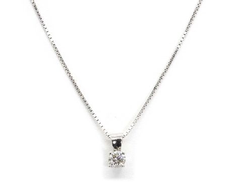 A white gold diamond pendant and chain, with a round brilliant cut diamond, estimated as 0.25ct, in claw setting, to a fixed 