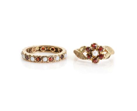 A 9ct gold opal and garnet eternity ring and a 9ct gold seed pearl and garnet cluster ring, the eternity ring with round opal
