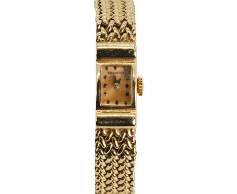 A ladies' gold mechanical watch, c.1960, the curved rectangular case with a champagne dial, black enamel hour markers, and sp