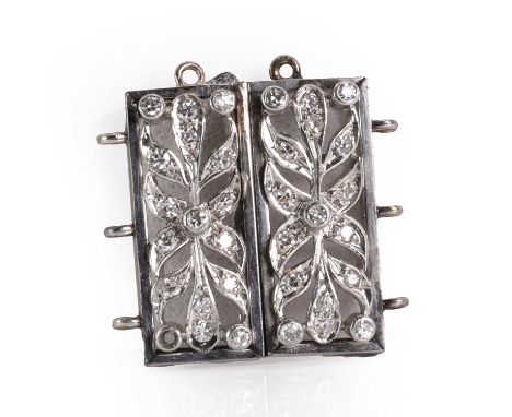 A three row diamond set pearl clasp,  with a pair of flat three row spacer bars. The rectangular slide action clasp with two 