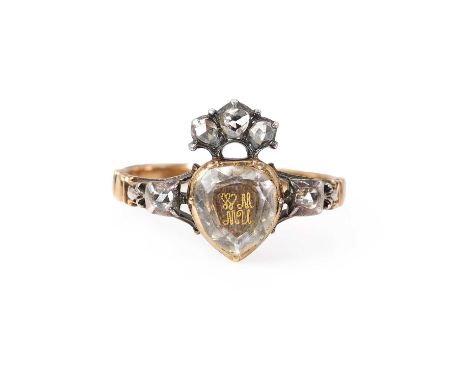 An antique rock crystal and rose cut diamond memorial ring,  designed as a crowned heart, with a central heart-shaped faceted