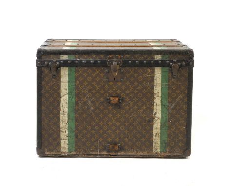 A Louis Vuitton monogrammed canvas cabin trunk, c.1910, the exterior with three front brass buckles, studded leather edging, 