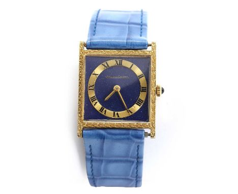 A ladies' 18ct gold Jaeger LeCoultre mechanical strap watch, with a square engraved case, the navy enamel dial with gold flec