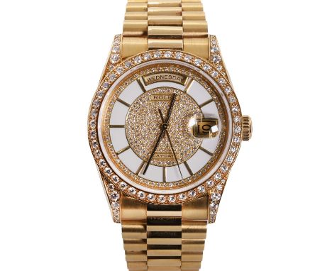 A gentlemen's 18ct gold diamond set Rolex Day Date automatic bracelet watch,  ref.18388, c.1990, 36mm case, with a white enam