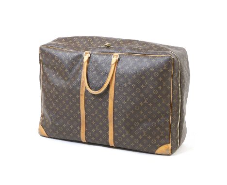 A Louis Vuitton monogrammed canvas Sirius 70, vachetta leather dual handles, edging and details, with luggage tag, gold tone 