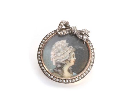 A 19th century miniature brooch, the miniature painted on ivory depicting a lady in a hat, in a circular frame bead set with 