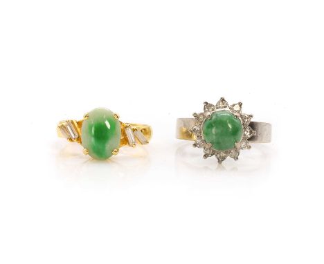 Two jade and diamond rings, a jade and diamond ring,in a four claw setting, with four tapered baguette cut diamonds around, t