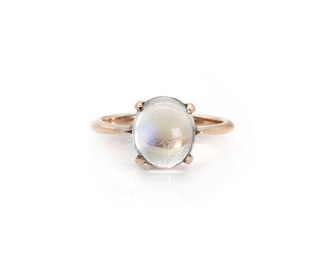 An Edwardian moonstone ring,  with an oval moonstone cabochon, four claw set, to tapered shoulders into a D profile shank, st