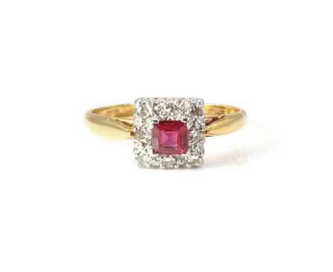 A ruby and diamond ring,  with a central square step cut ruby, to a surround of eight cut diamonds, all set in white to a yel