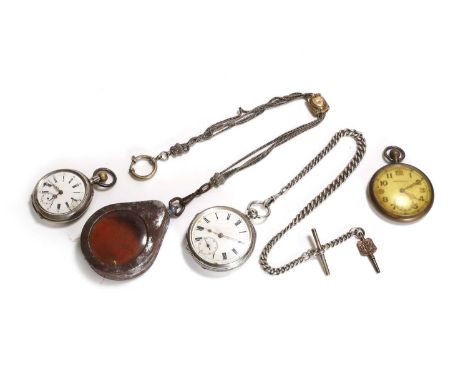 A group of three open faced pocket watches, comprising a Continental silver top wind open faced pocket watch, base metal cuve