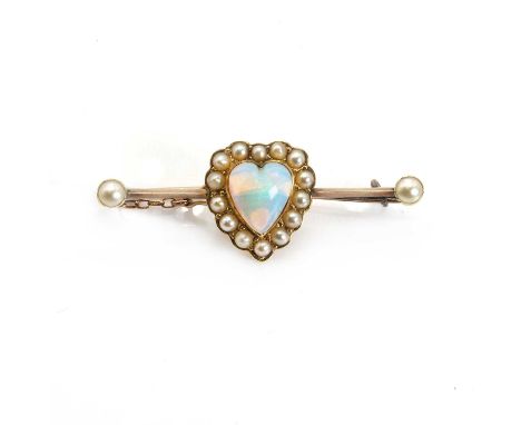 An Edwardian opal and split pearl brooch, with a central heart shaped opal cabochon, to a surround of split pearls, upon a kn