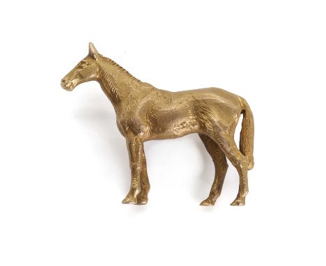 A 9ct gold horse brooch, by Alabaster & Wilson, in the form of a tridimensional standing horse, in textured gold, with pin an