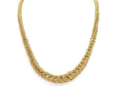 An 18ct gold graduated fancy link chain necklace, c.1960, designed as a series of tridimensional links of graduating size, wi