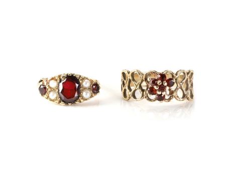 Two garnet set rings, a 9ct gold garnet and split pearl ring, with a central oval cut garnet, flanked by round cut garnets an