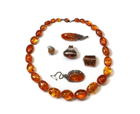 A group of clarified amber jewellery, comprising a graduated single row clarified amber bead necklace, with beads approximate