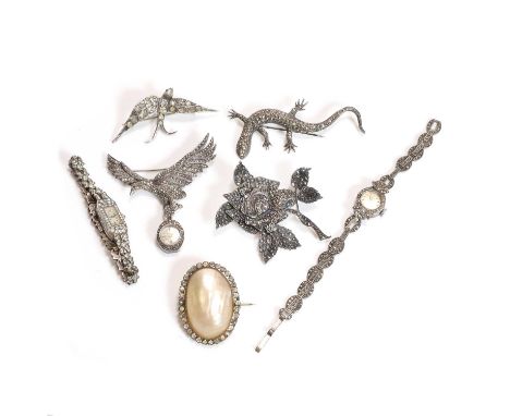 A small collection of silver jewellery, comprising a marcasite rose brooch, 62mm x 64mm, stamped silver, a marcasite lizard b