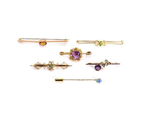 A collection of five bar brooches and a stick pin, comprising a Regency amethyst and cannetille frame, later mounted to a bar