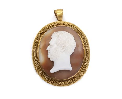 A Victorian shell cameo pendant, composite, with the realistic portrait of a man facing left, possibly Roman or Grecian, in a