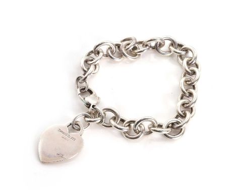 A sterling silver heart tag bracelet by Tiffany & Co., the cable link bracelet suspending a heart tag charm marked Tiffany &a