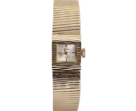 A ladies' 9ct gold Centaur mechanical bracelet watch, a rectangular case, 14mm x 17mm, surrounding a square silvered dial, in