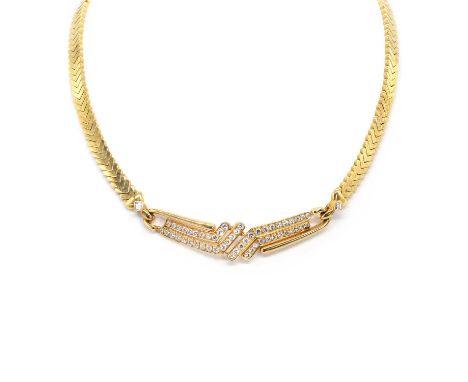 An 18ct gold diamond necklace, by OJ Perrin, with a central articulated open crossover panel grain set with four lines of rou