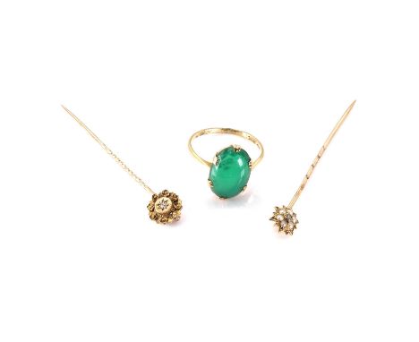 A single stone stained agate ring, c.1930, marked 9CT, a diamond and split pearl star stick pin, marked 18 with a 9ct gold pi
