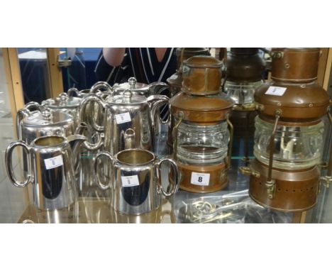 A silver plated tea service, pair of small copper ship lamps and sundry brassware's.