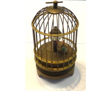 A bird cage automaton clock, height 16cm.