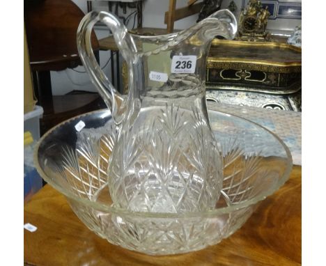 A modern glass jug and basin set