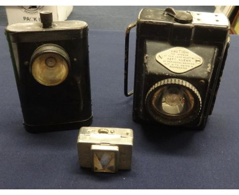 Four vintage battery hand torches.