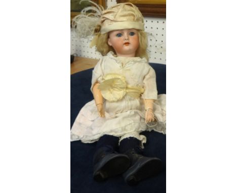 A Simon and Halbig, K &amp; R, bisque headed doll, with composition jointed body, height approx 34cm