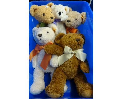 Five reproduction Steiff teddy bears.