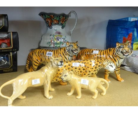 Five various Beswick models tigers and leopards also an early 20th Century jug and basin set.