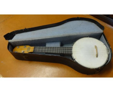 A Fitzroy vintage four string banjo ukulele.