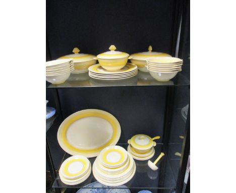 A Grays pottery 'Sunbuff' dinner service in yellow and black  