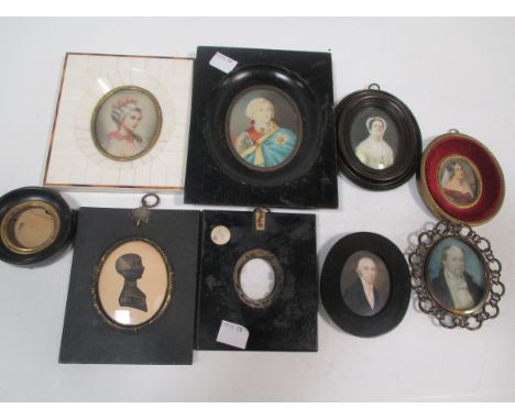 A collection of portrait miniatures to include a French lady in an ivory frame, sillhouete and two ebonised frames for miniat