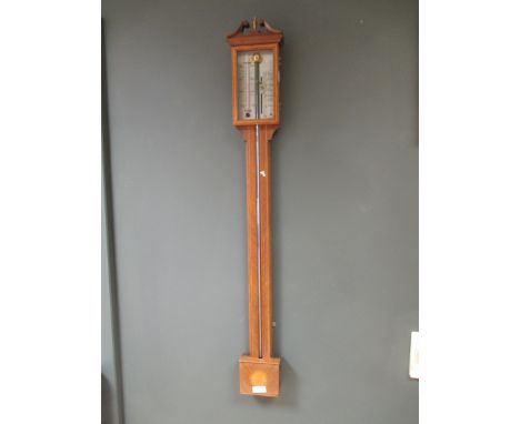 A mercury barometer in a mahogany stick case  